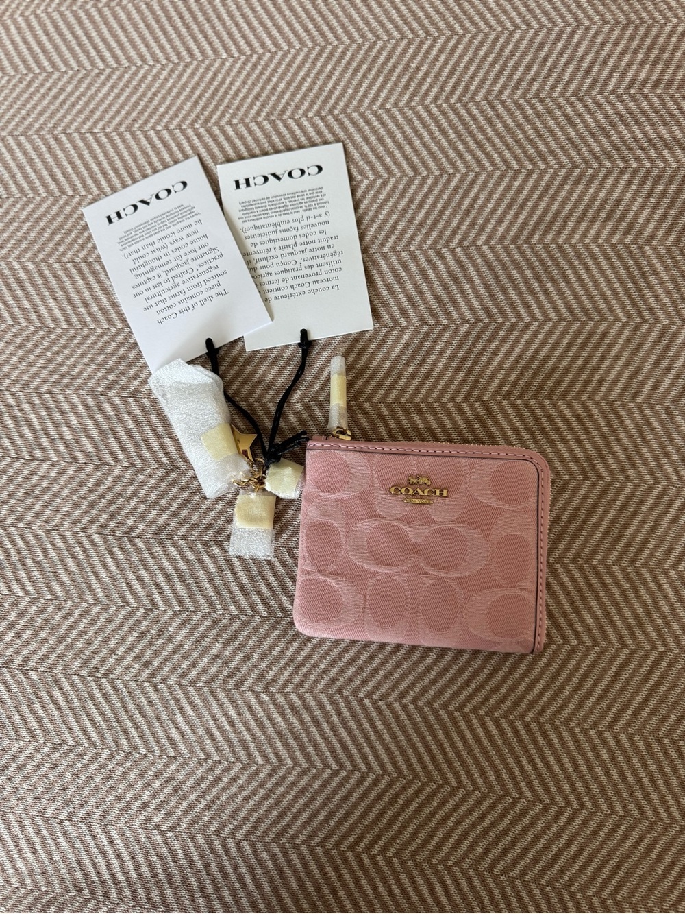 Coach Blush Pink Signature Zip Wallet with Charm Accent